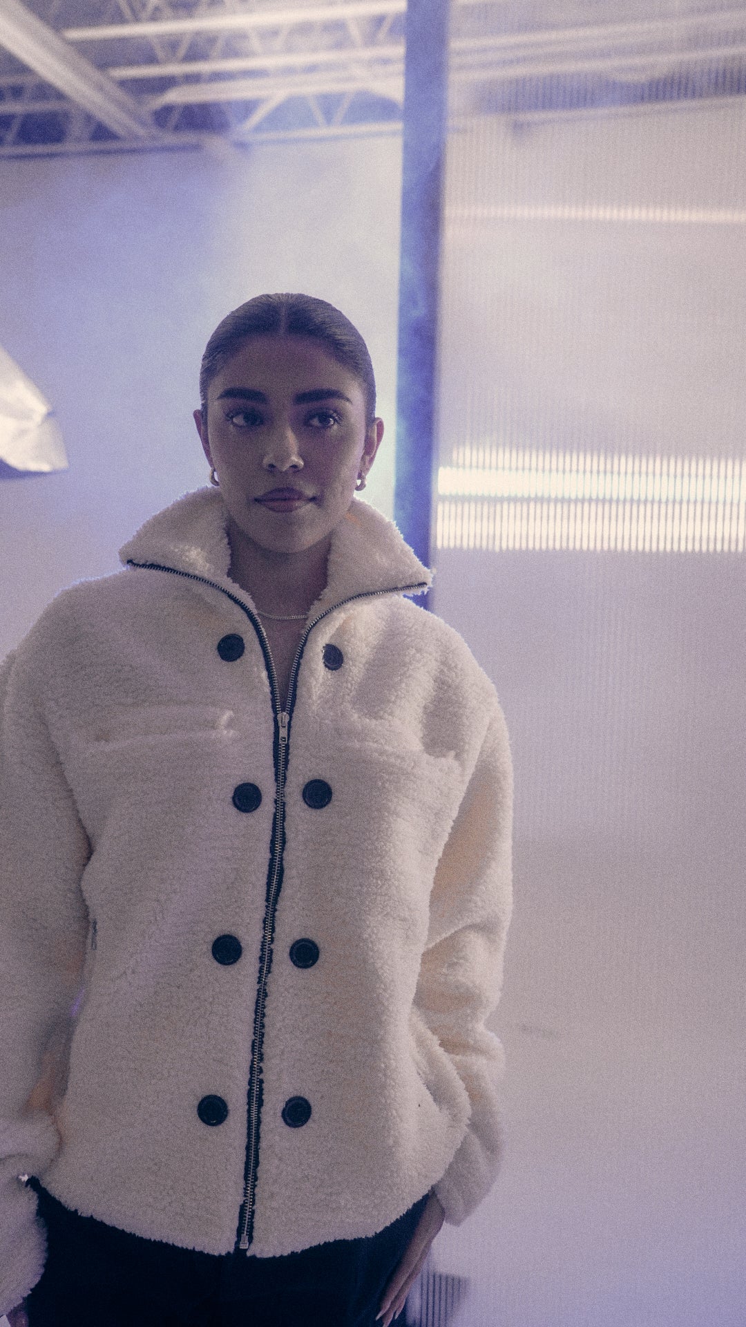 AMAAR Designs off-white satin-lined sherpa jacket worn by model, front view — City Nights Collection